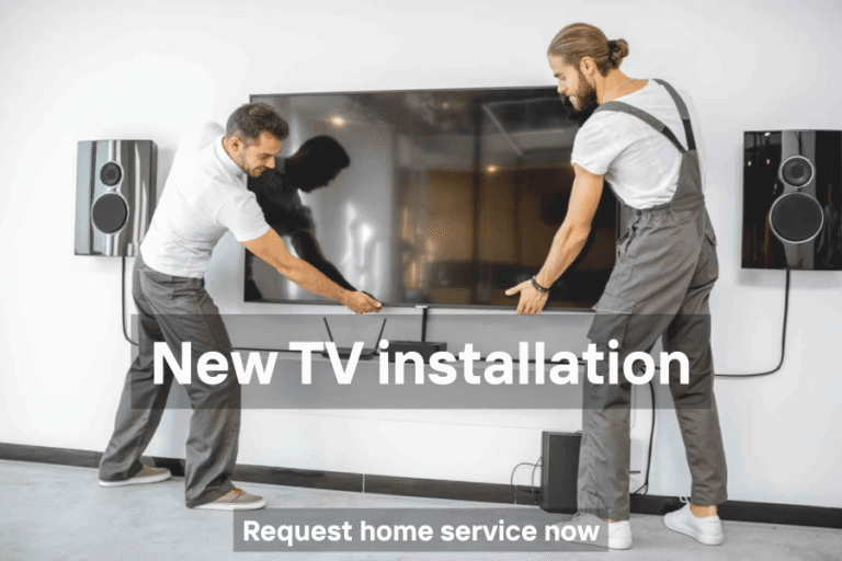 Technician installing a new TV on the wall or stand at home
