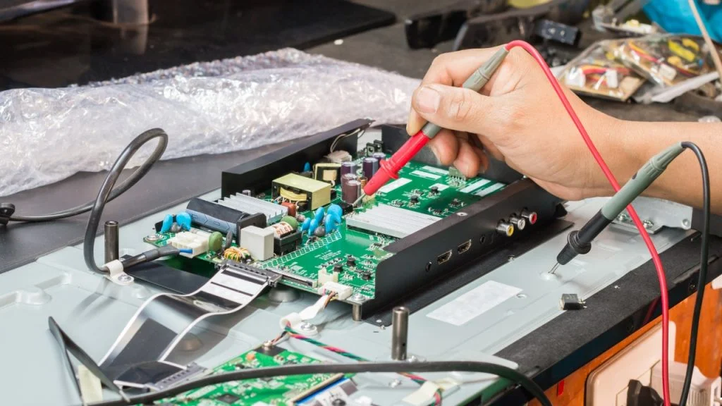 TV repair Uttara — certified technician diagnosing Samsung LED TV